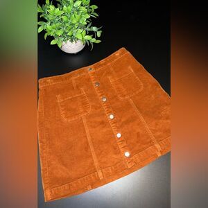 Urban Outfitters velvet corduroy burnt orange mini skirt size Fall Medium EUC
